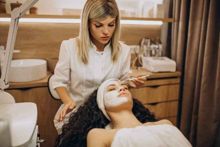 Woman visiting cosmetologist and making rejuvenation procedures
